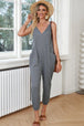 Spaghetti Strap Deep V Jumpsuit with Pockets Trendsi