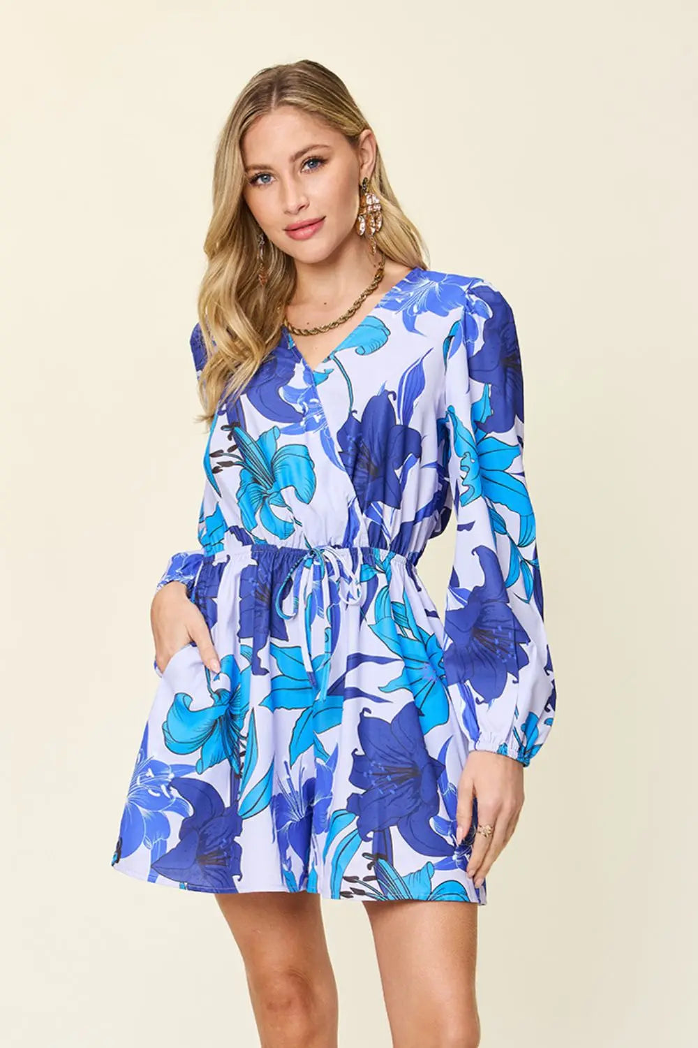  Full Size Floral Long Sleeve Romper with Pockets Trendsi