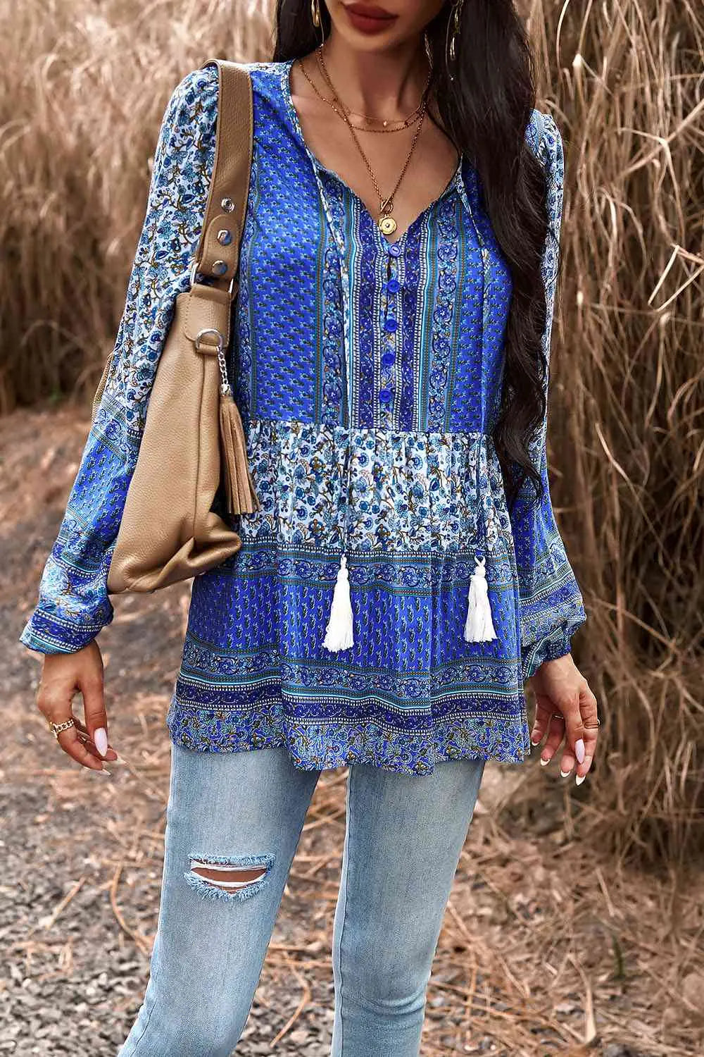 Tassel Tie Long Sleeve Peplum Blouse Trendsi