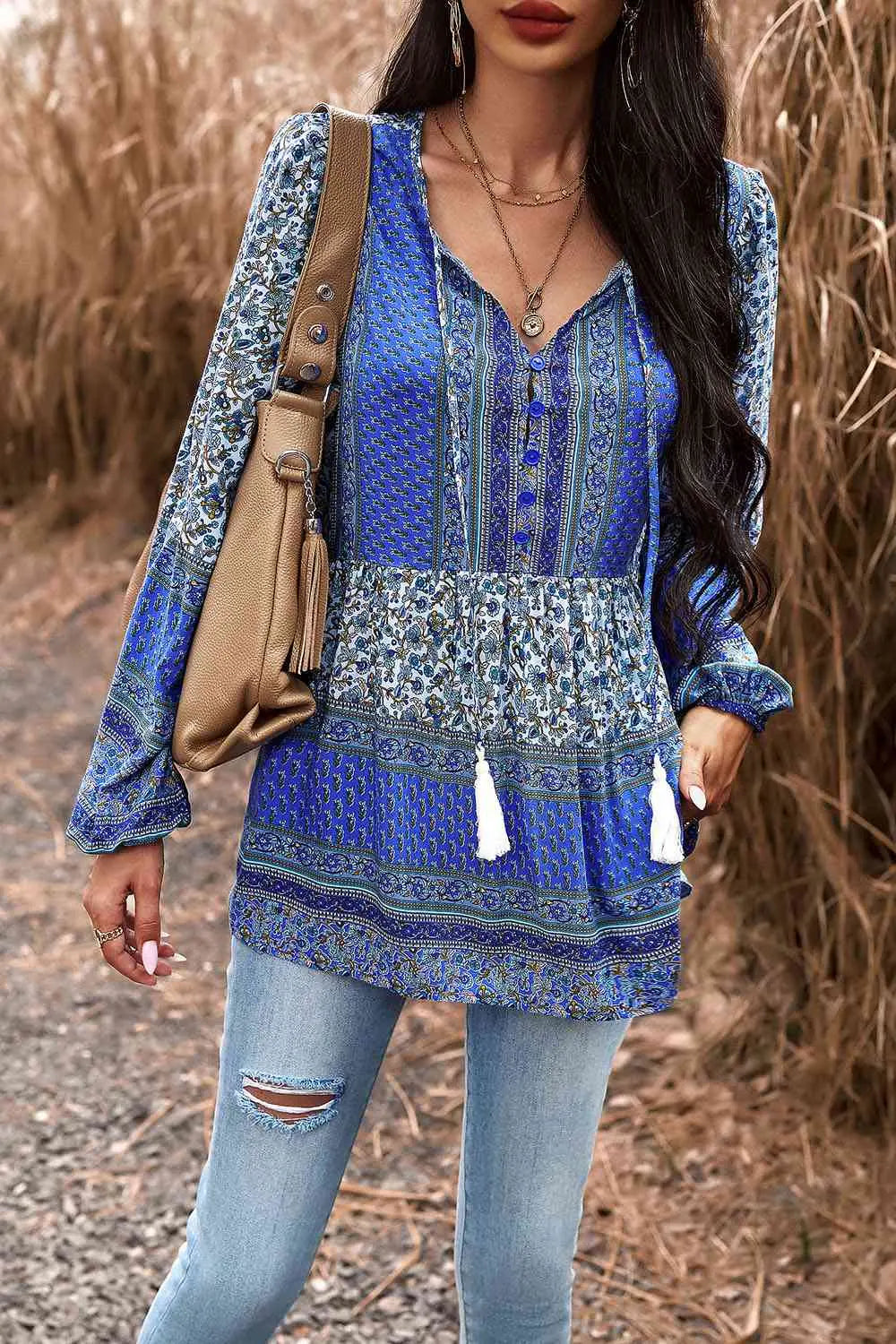 Tassel Tie Long Sleeve Peplum Blouse Trendsi